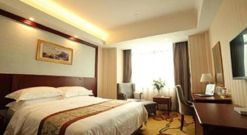 Bed in Vienna Classic Hotel Ningbo Xiangshan Wanda