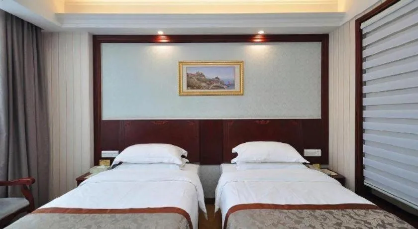 Bed in Vienna Classic Hotel Ningbo Xiangshan Wanda