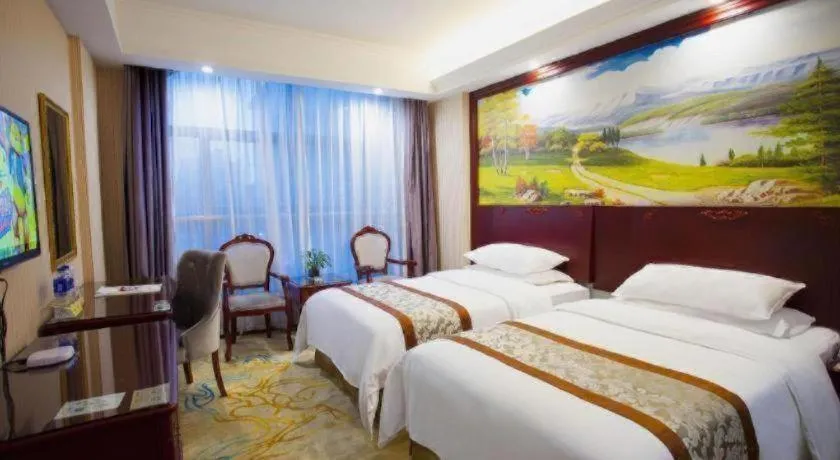 Bed in Vienna Classic Hotel Ningbo Xiangshan Wanda
