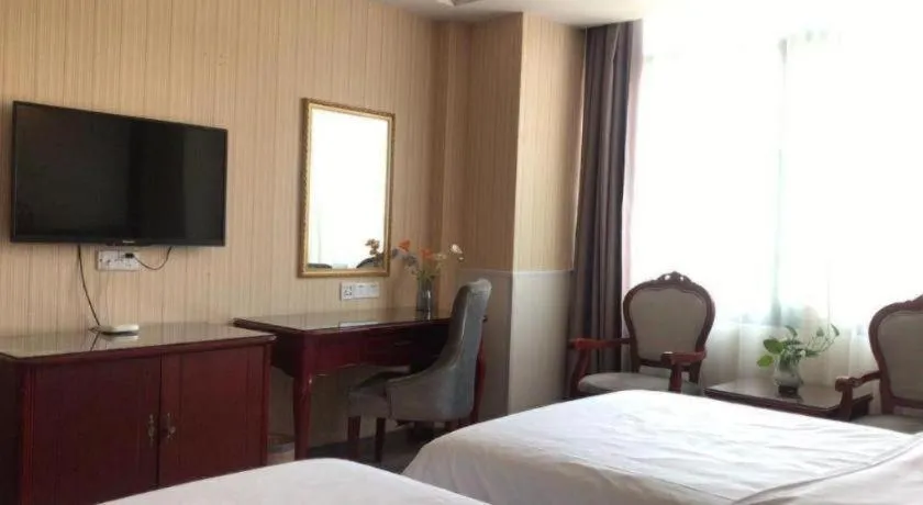 Bed in Vienna Classic Hotel Ningbo Xiangshan Wanda