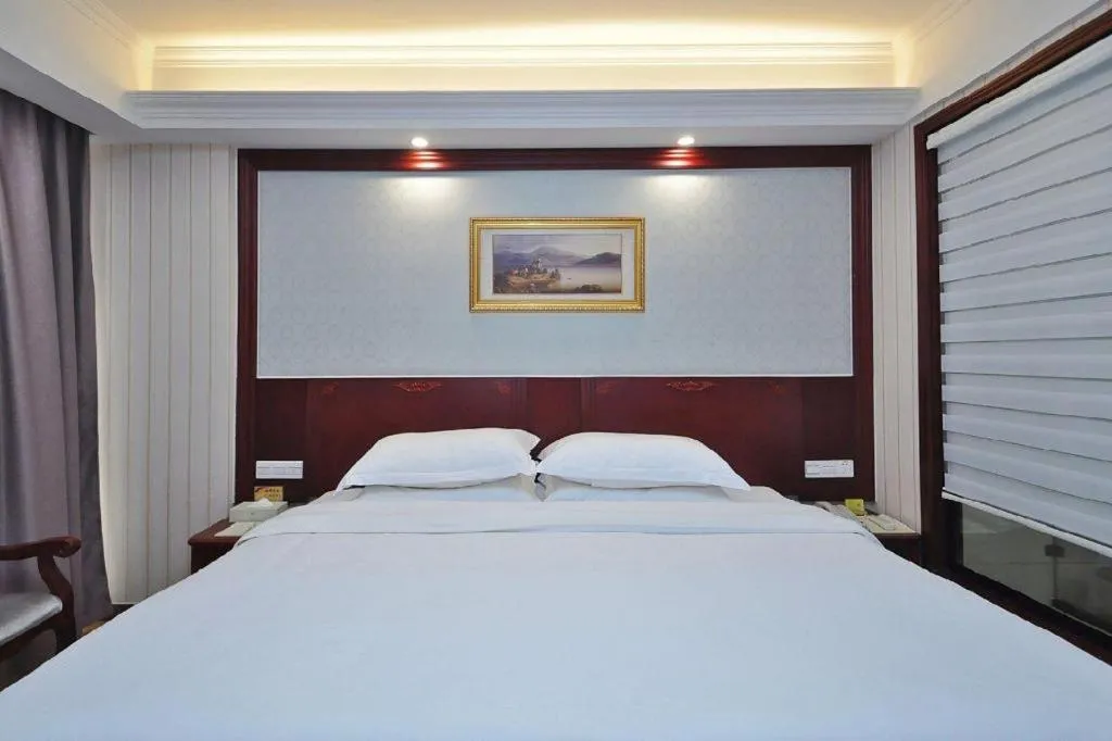 Bed in Vienna Classic Hotel Ningbo Xiangshan Wanda