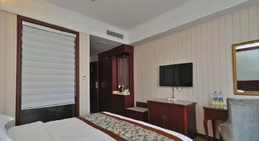 Bed in Vienna Classic Hotel Ningbo Xiangshan Wanda