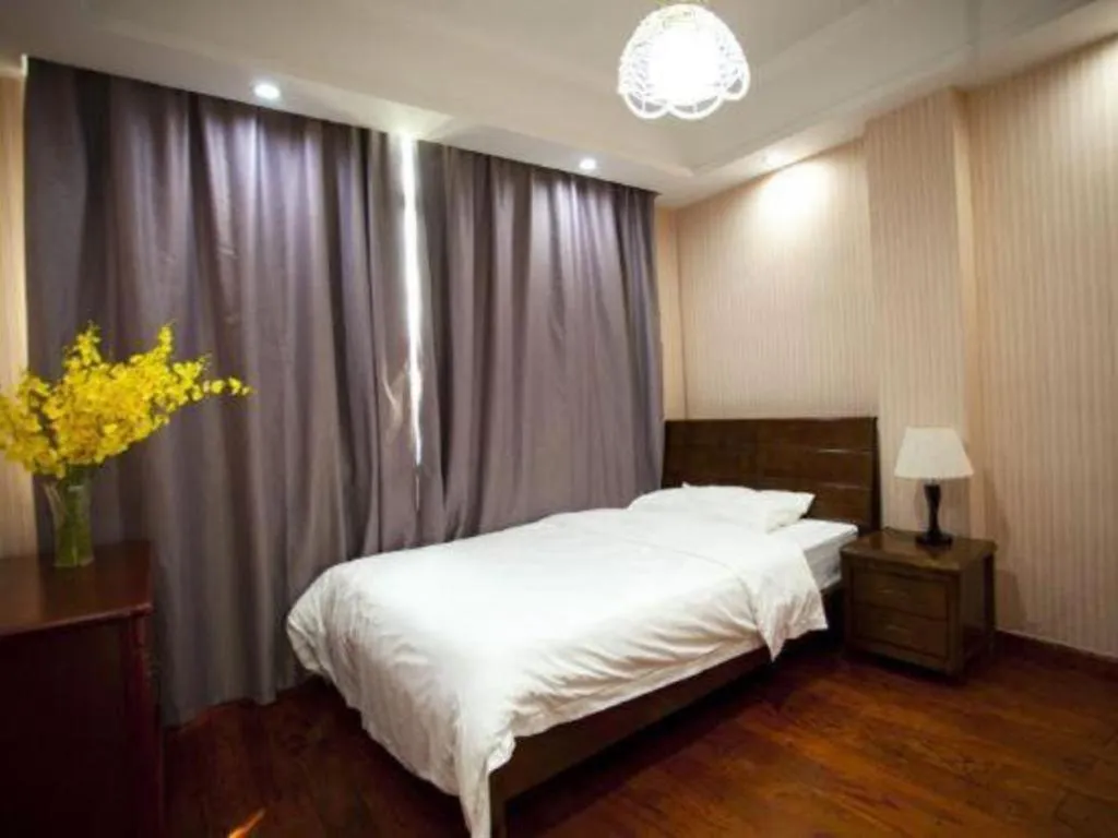 Bed in Vienna Classic Hotel Ningbo Xiangshan Wanda