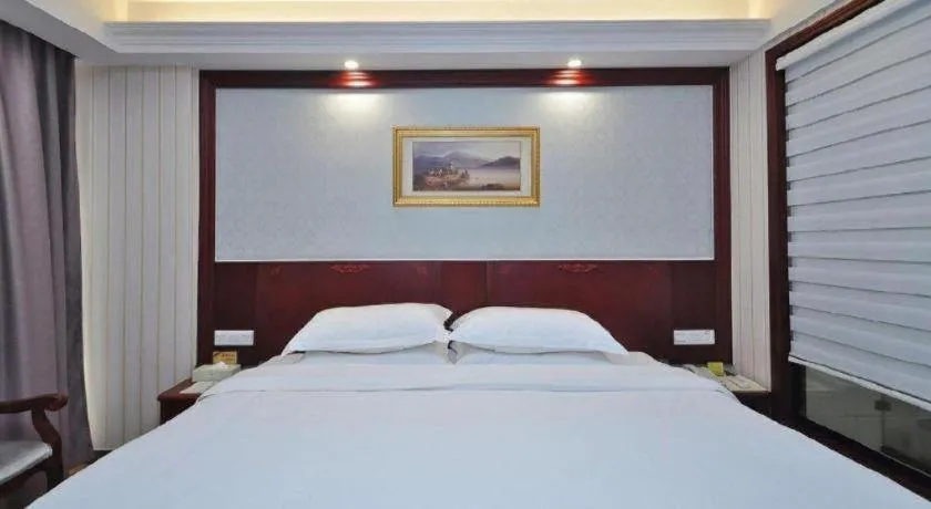 Bed in Vienna Classic Hotel Ningbo Xiangshan Wanda