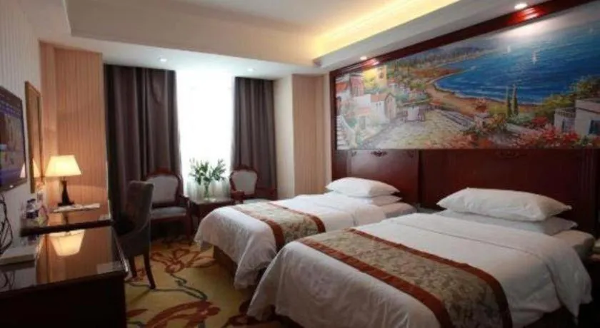 Bed in Vienna Classic Hotel Ningbo Xiangshan Wanda