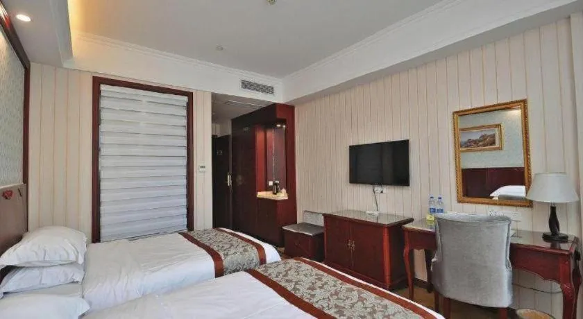 Bed in Vienna Classic Hotel Ningbo Xiangshan Wanda