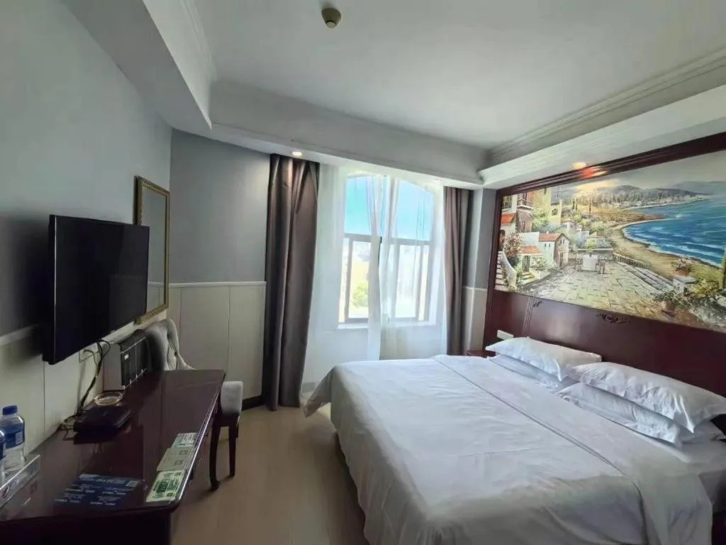 Bed in Vienna Classic Hotel Ningbo Xiangshan Wanda