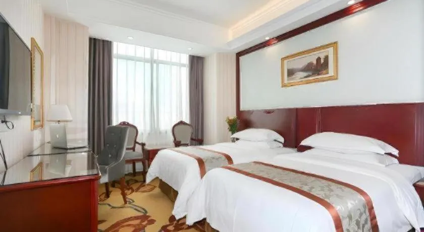 Bed in Vienna Classic Hotel Ningbo Xiangshan Wanda