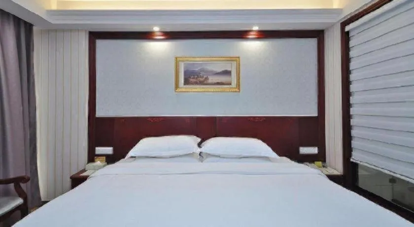 Bed in Vienna Classic Hotel Ningbo Xiangshan Wanda