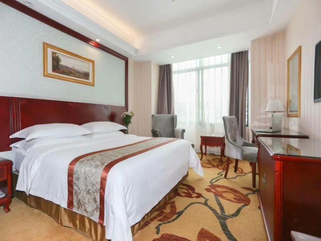 Bed in Vienna Classic Hotel Ningbo Xiangshan Wanda