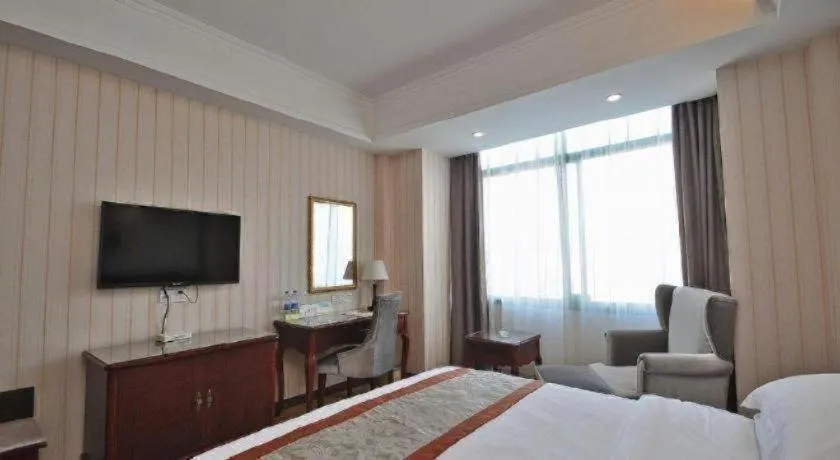 Bed in Vienna Classic Hotel Ningbo Xiangshan Wanda