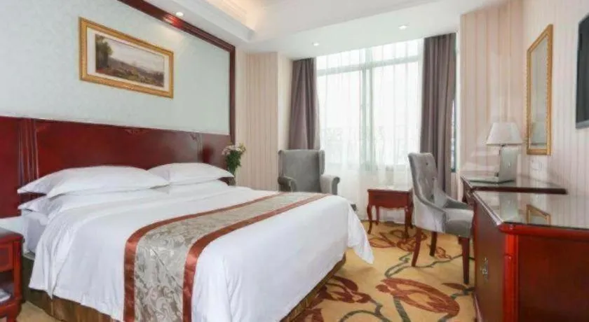 Bed in Vienna Classic Hotel Ningbo Xiangshan Wanda