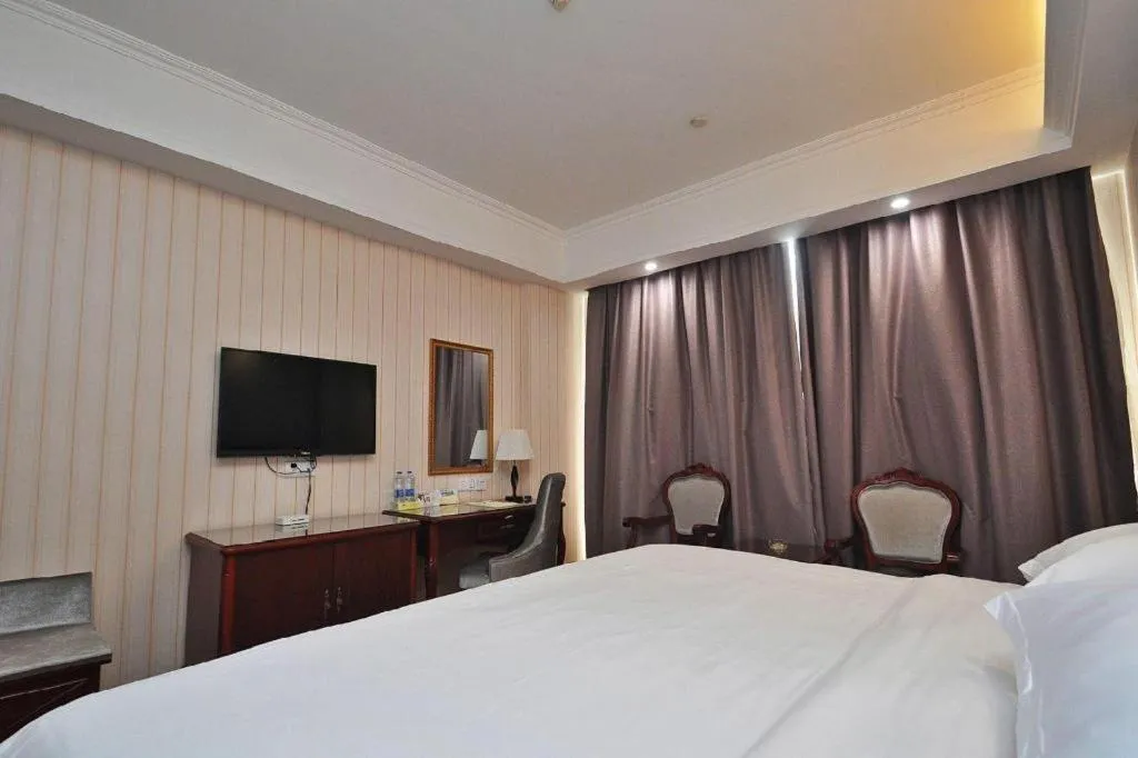 Bed in Vienna Classic Hotel Ningbo Xiangshan Wanda