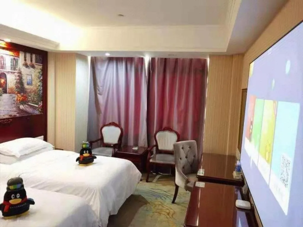 Bed in Vienna Classic Hotel Ningbo Xiangshan Wanda