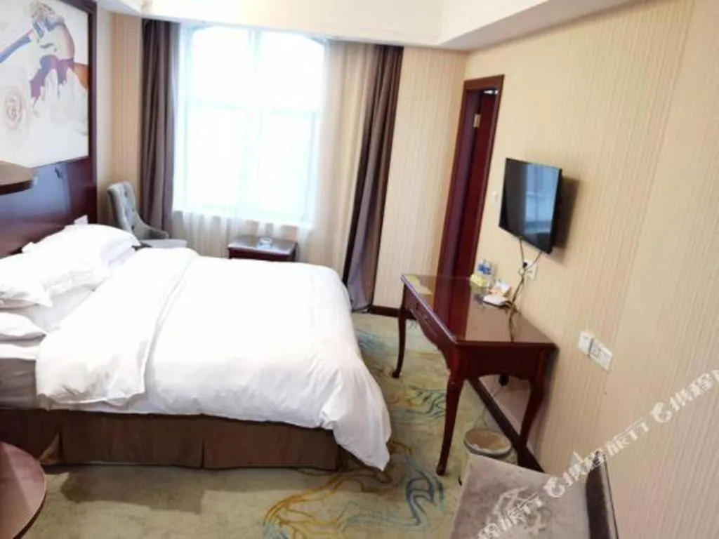 Bed in Vienna Classic Hotel Ningbo Xiangshan Wanda