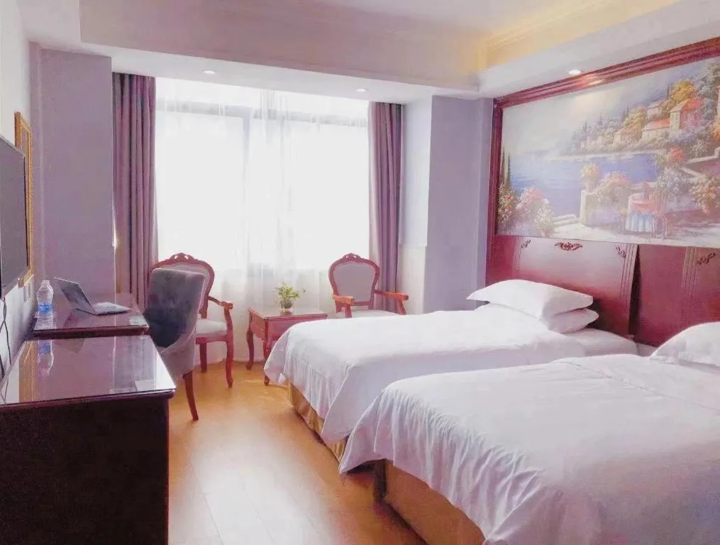 Bed in Vienna Classic Hotel Ningbo Xiangshan Wanda