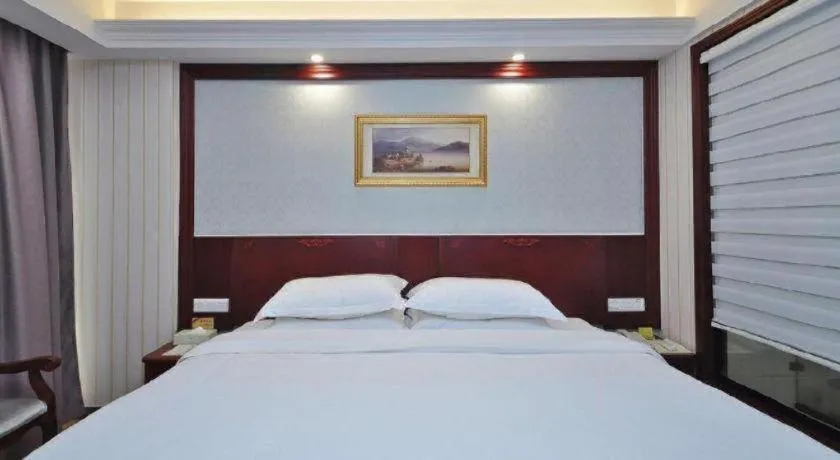Bed in Vienna Classic Hotel Ningbo Xiangshan Wanda