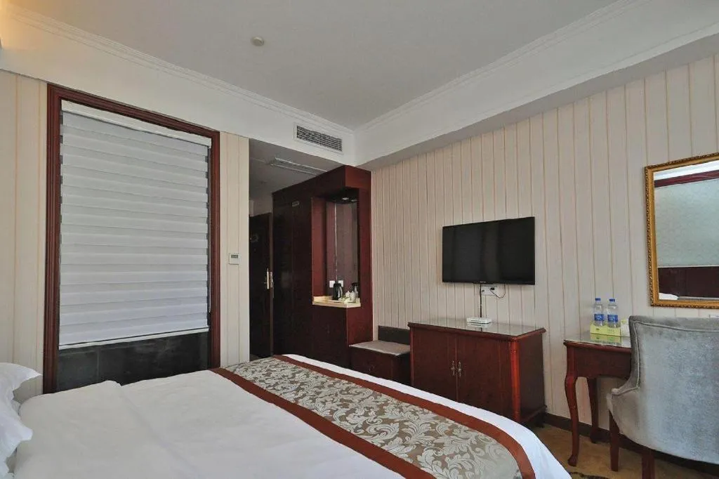 Bed in Vienna Classic Hotel Ningbo Xiangshan Wanda