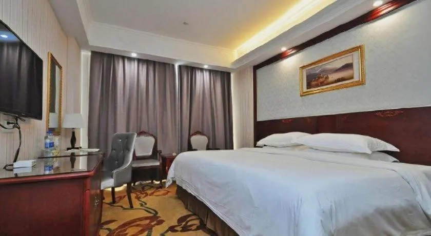Bed in Vienna Classic Hotel Ningbo Xiangshan Wanda
