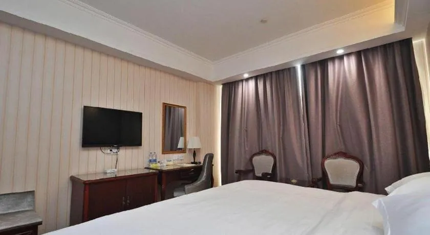 Bed in Vienna Classic Hotel Ningbo Xiangshan Wanda