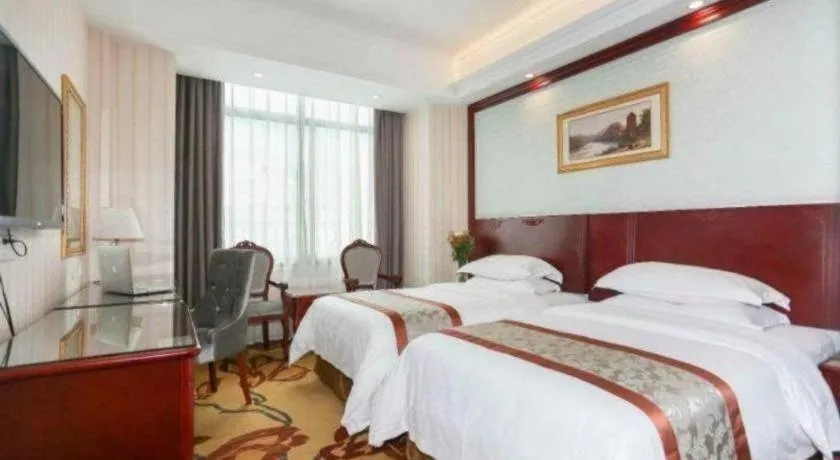 Bed in Vienna Classic Hotel Ningbo Xiangshan Wanda