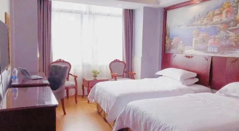 Bed in Vienna Classic Hotel Ningbo Xiangshan Wanda