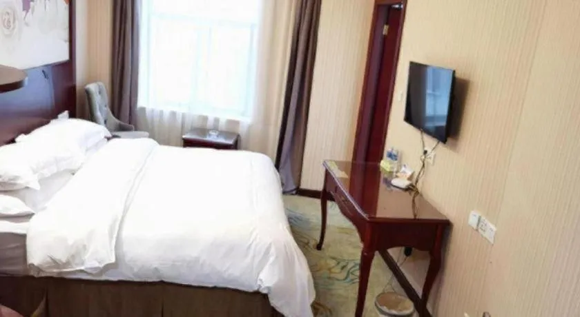 Bed in Vienna Classic Hotel Ningbo Xiangshan Wanda