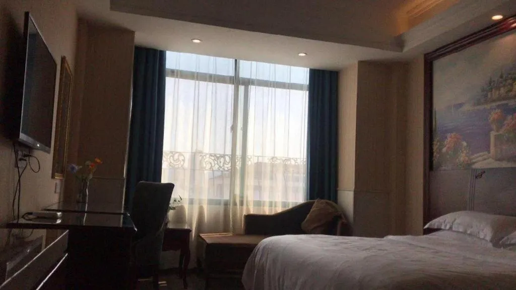 Bed in Vienna Classic Hotel Ningbo Xiangshan Wanda