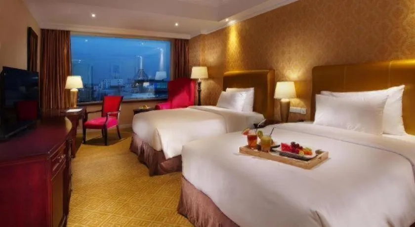 Bed in Adimulia Hotel Medan