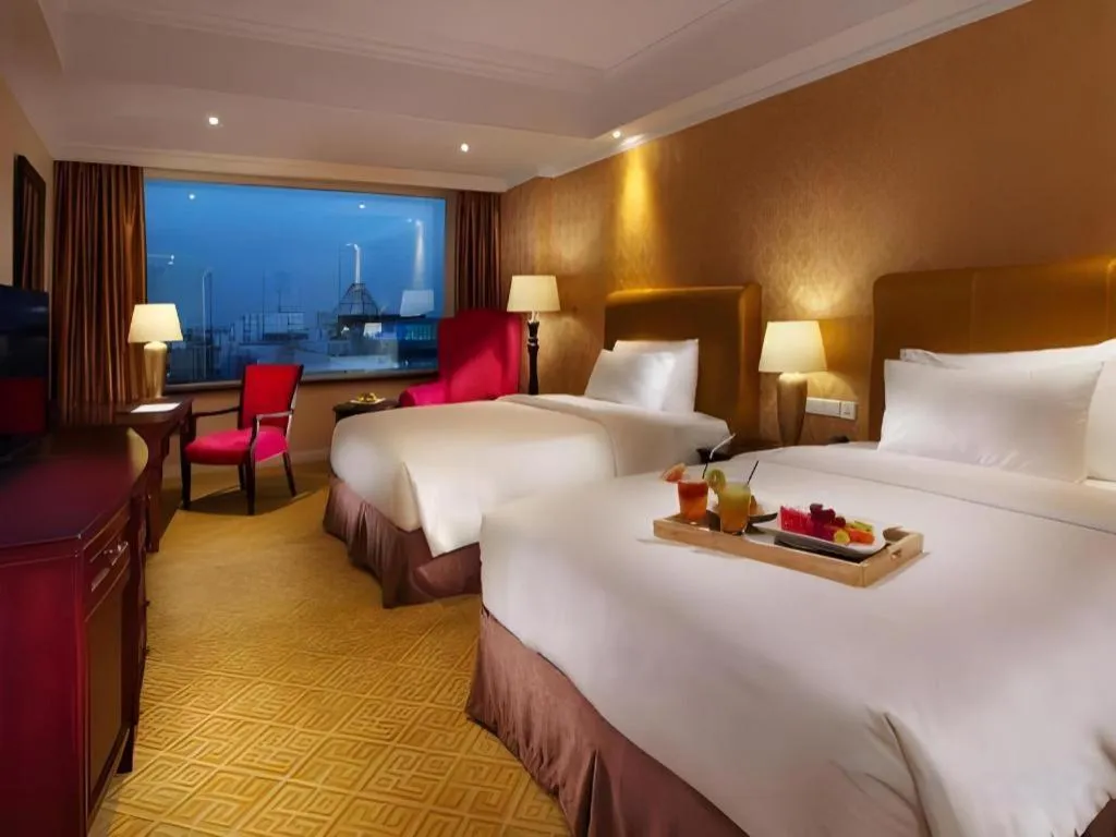 Bed in Adimulia Hotel Medan