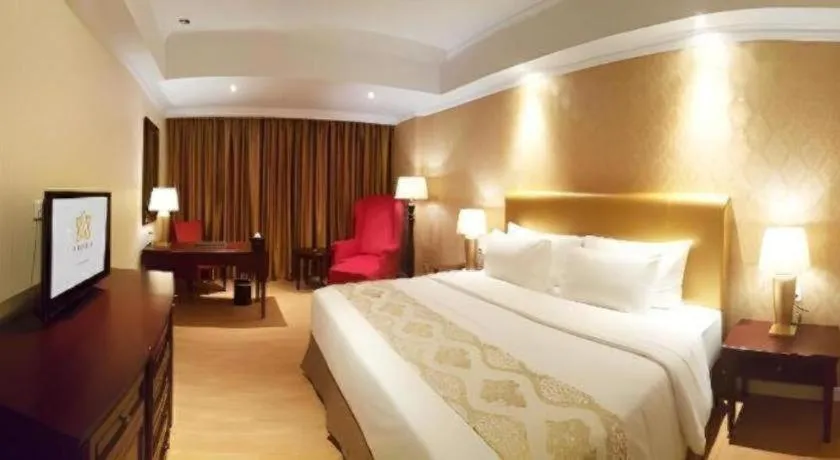Bed in Adimulia Hotel Medan