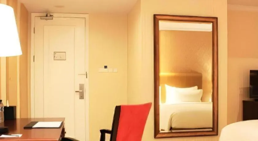 Bed in Adimulia Hotel Medan