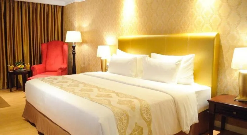 Bed in Adimulia Hotel Medan