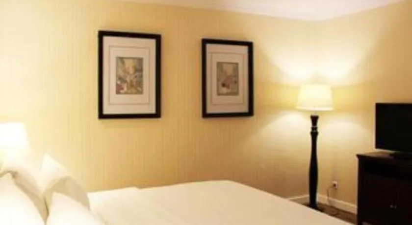 Bed in Adimulia Hotel Medan