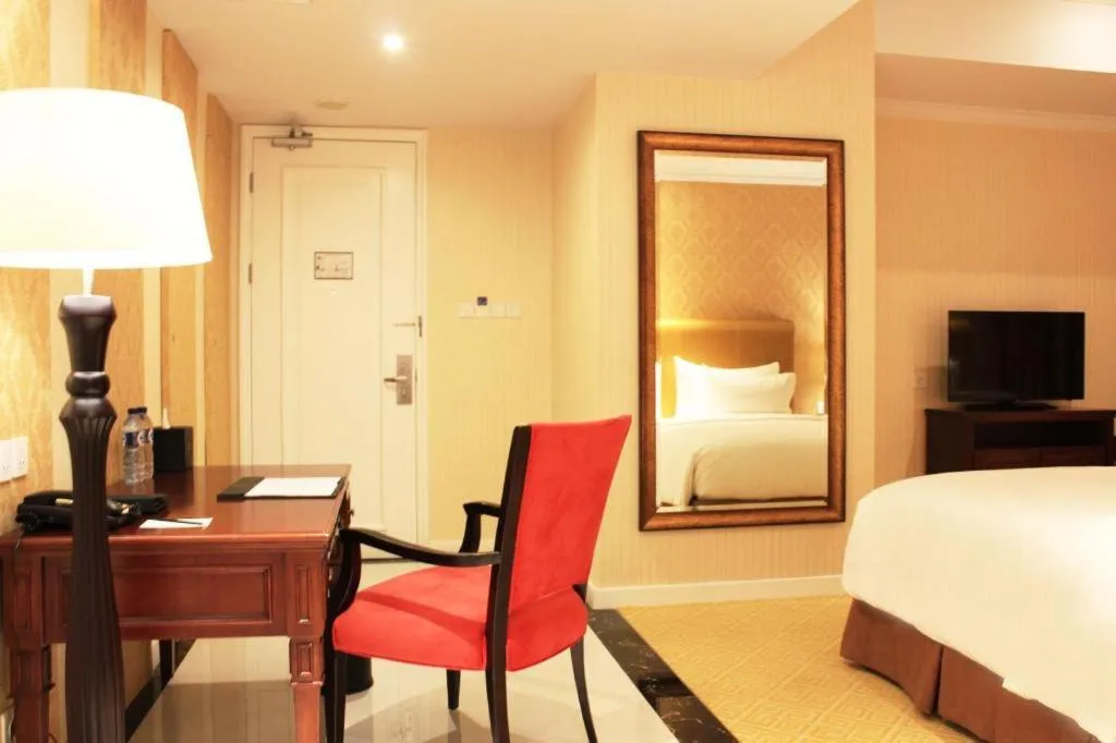Bed in Adimulia Hotel Medan