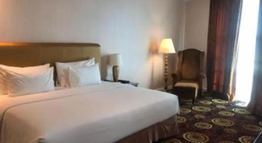 Bed in Adimulia Hotel Medan