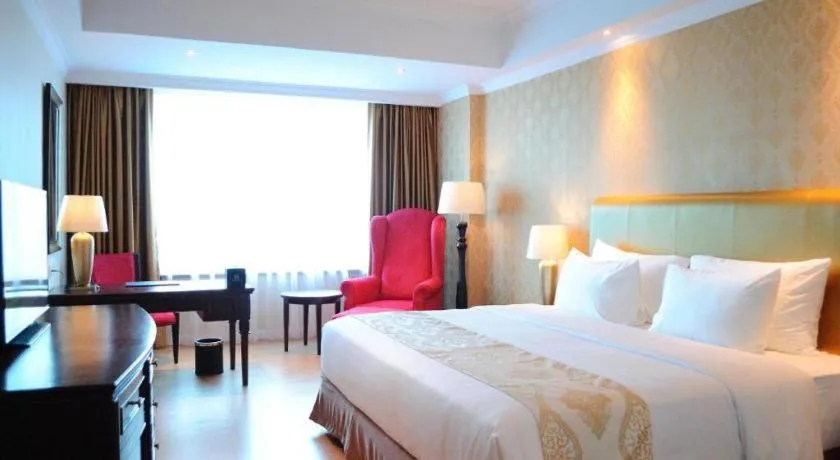 Bed in Adimulia Hotel Medan