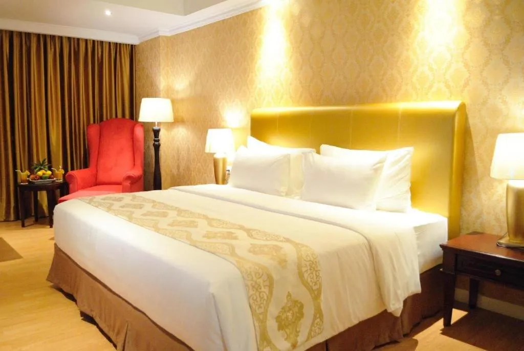 Bed in Adimulia Hotel Medan