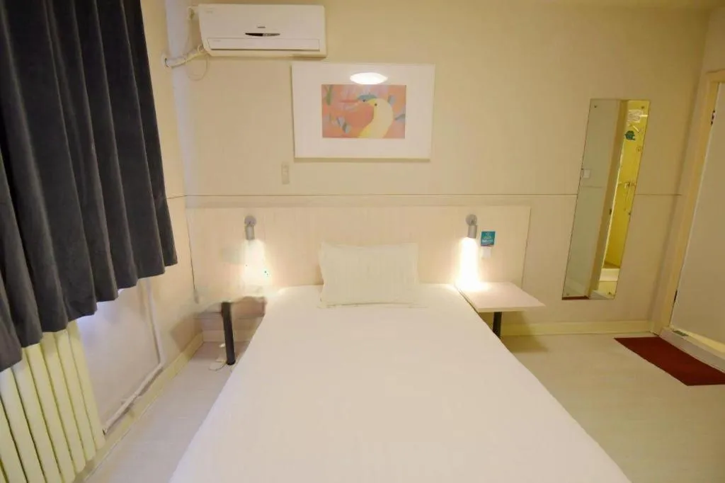 Bed in Jinjiang Inn Tai'an Taishan Railway Station