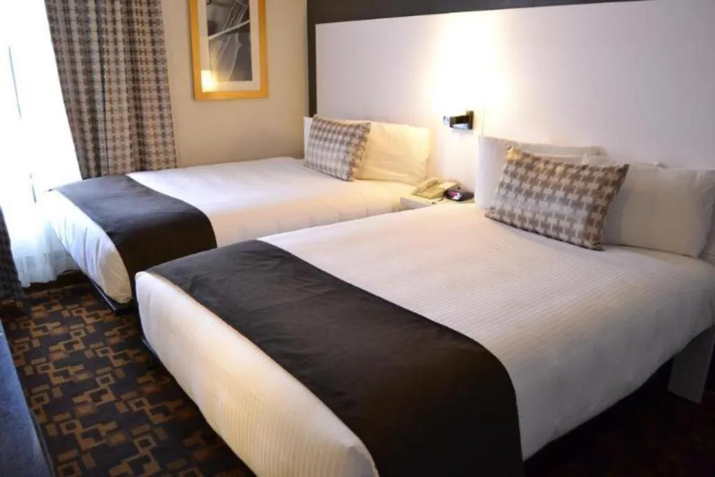 Bed in Adante Hotel, a C-Two Hotel