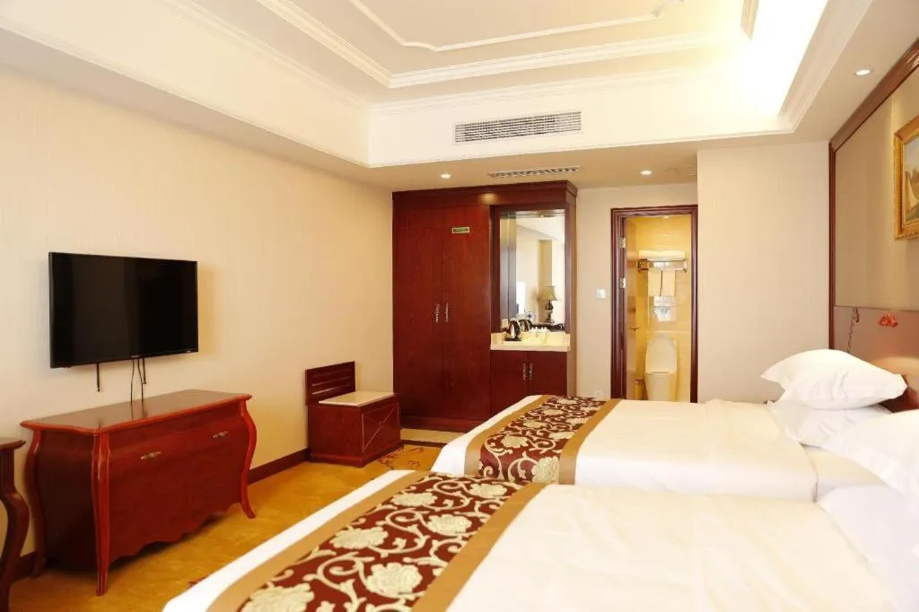 Bed in Vienna Hotel Shanghai Hongqiao Huaxin Road