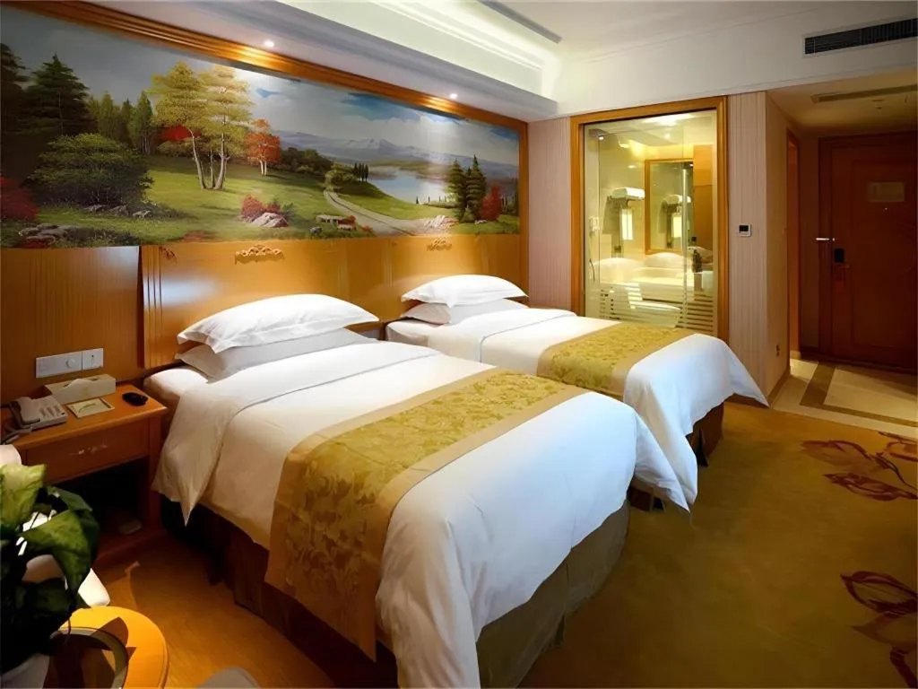Bed in Vienna Hotel Shanghai Hongqiao Huaxin Road