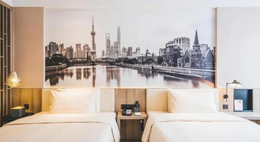 Bed in Vienna Hotel Shanghai Hongqiao Huaxin Road