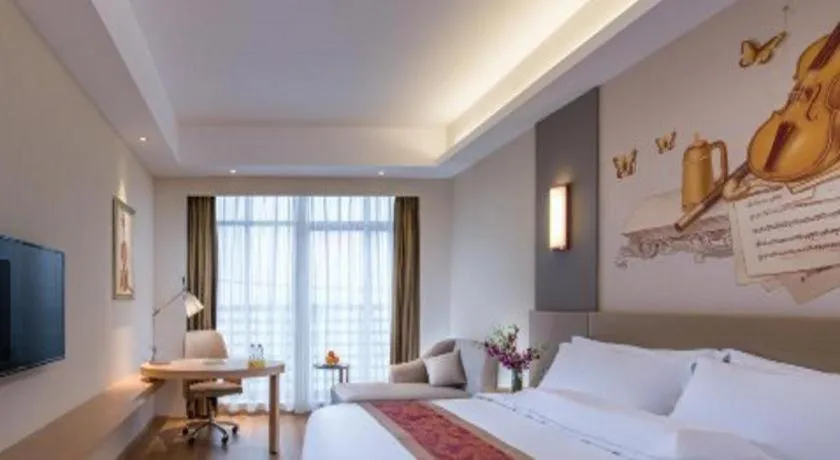 Bed in Vienna International Hotel Chengdu New Global Exhibition Center