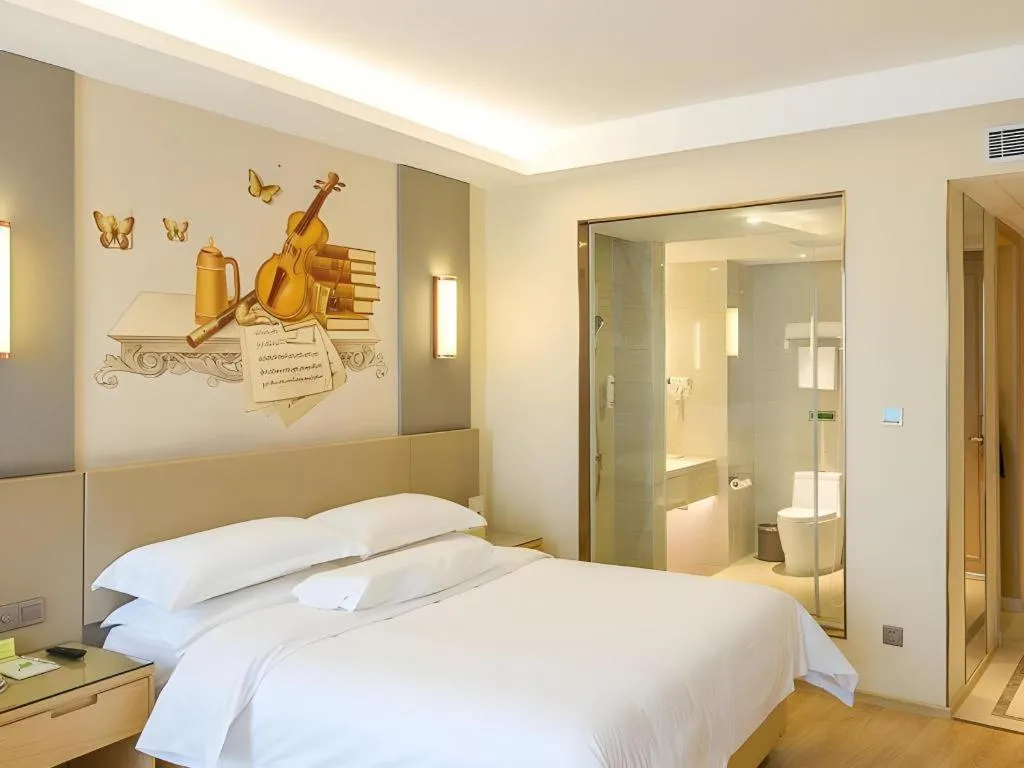 Bed in Vienna International Hotel Chengdu New Global Exhibition Center