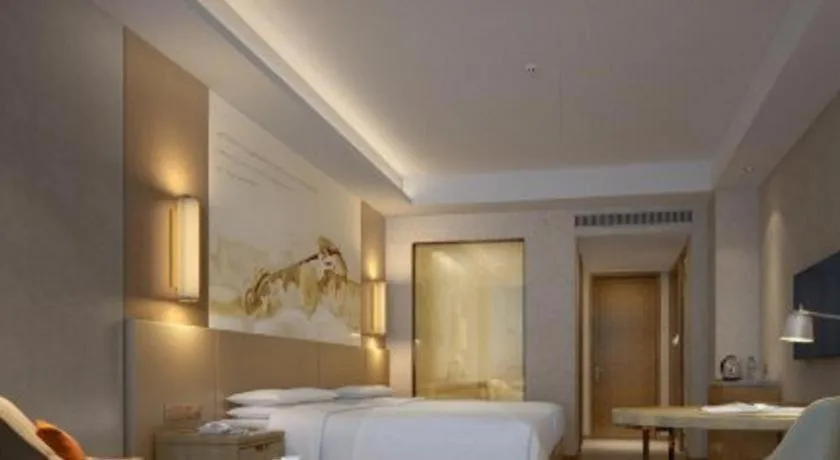 Bed in Vienna International Hotel Chengdu New Global Exhibition Center