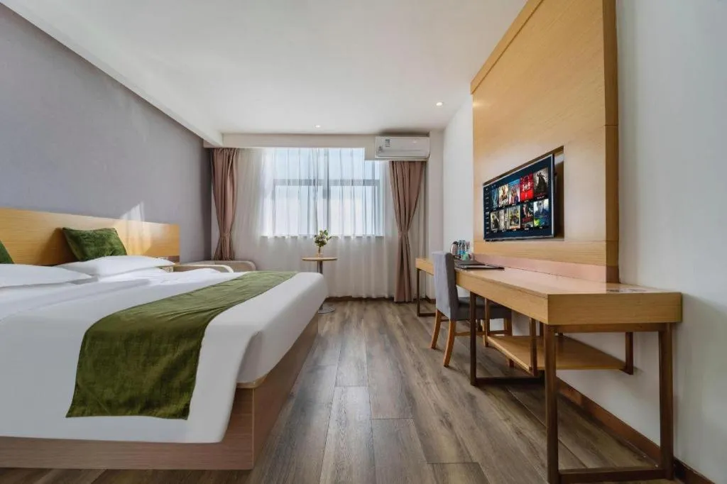Bed in GreenTree Inn Nantong Zhangzhishan Town Deli Plaza Express Hotel