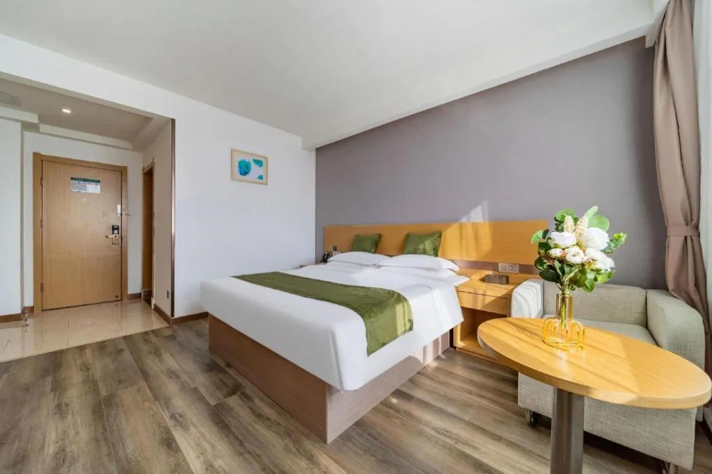 Bed in GreenTree Inn Nantong Zhangzhishan Town Deli Plaza Express Hotel