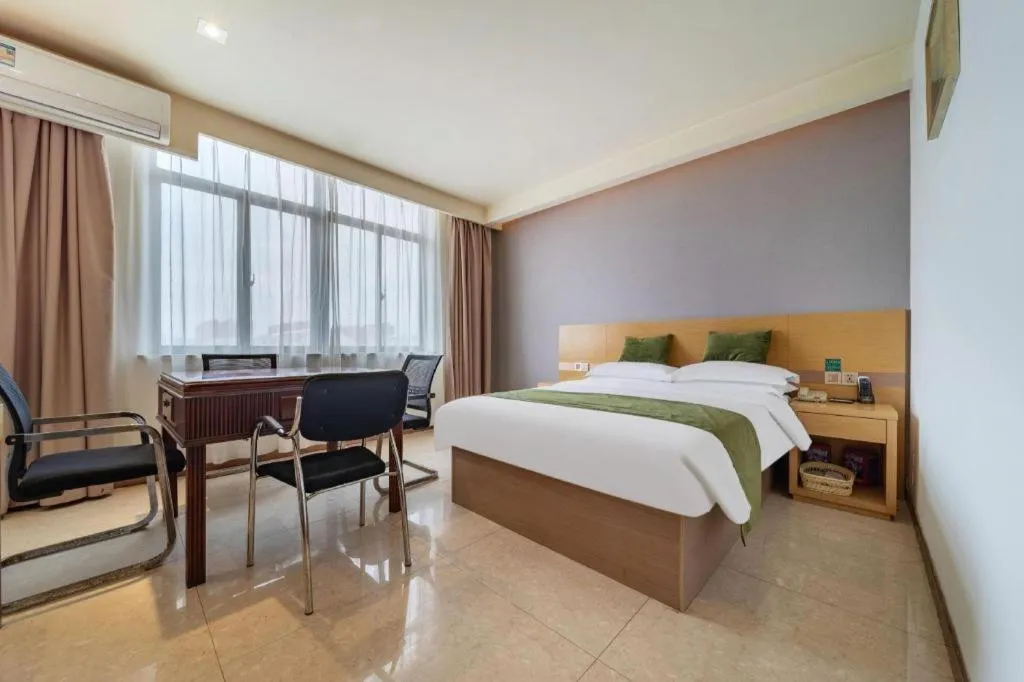 Bed in GreenTree Inn Nantong Zhangzhishan Town Deli Plaza Express Hotel