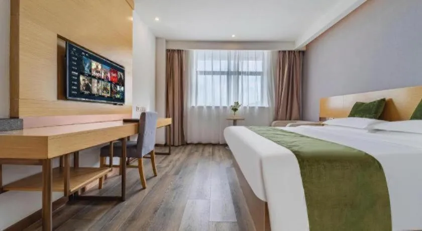 Bed in GreenTree Inn Nantong Zhangzhishan Town Deli Plaza Express Hotel